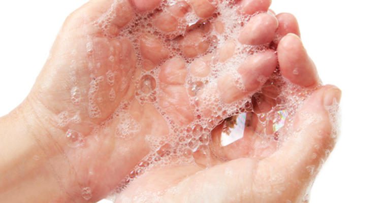 Hands with soapy water