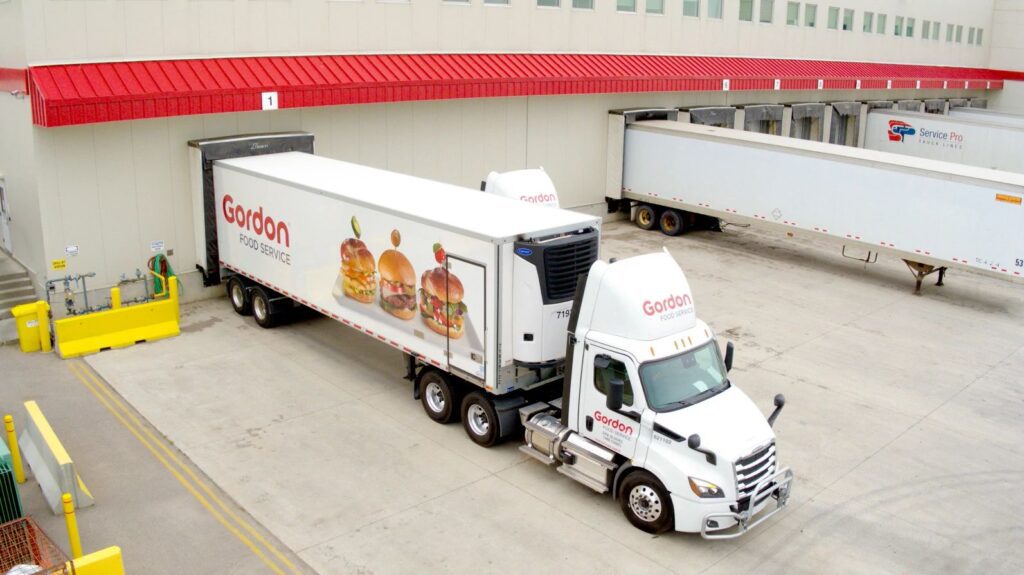 Gordon Food Service truck parked at the distribution center preparing to be loaded.