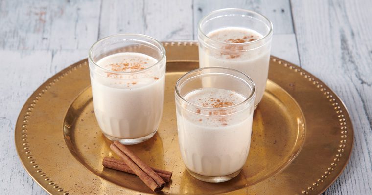 Coquito beverages in clear glasses
