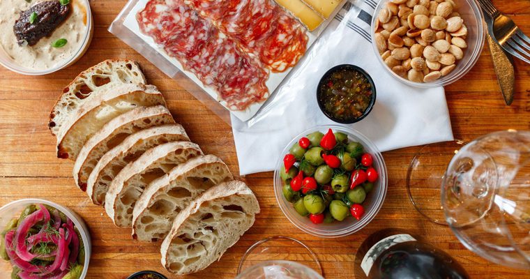 Puckett's charcuterie board, featuring meats, cheeses and breads