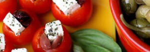 Cherry tomatoes stuffed with feta cheese.