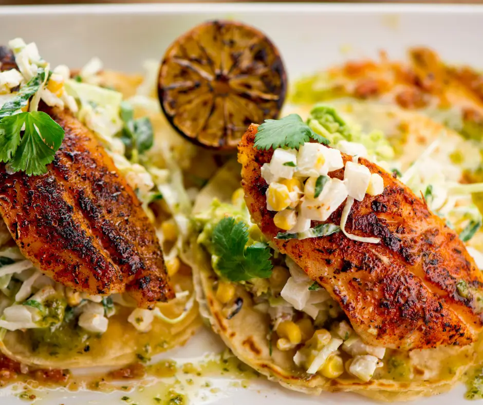 redfish tacos with green salsa and avocado crema